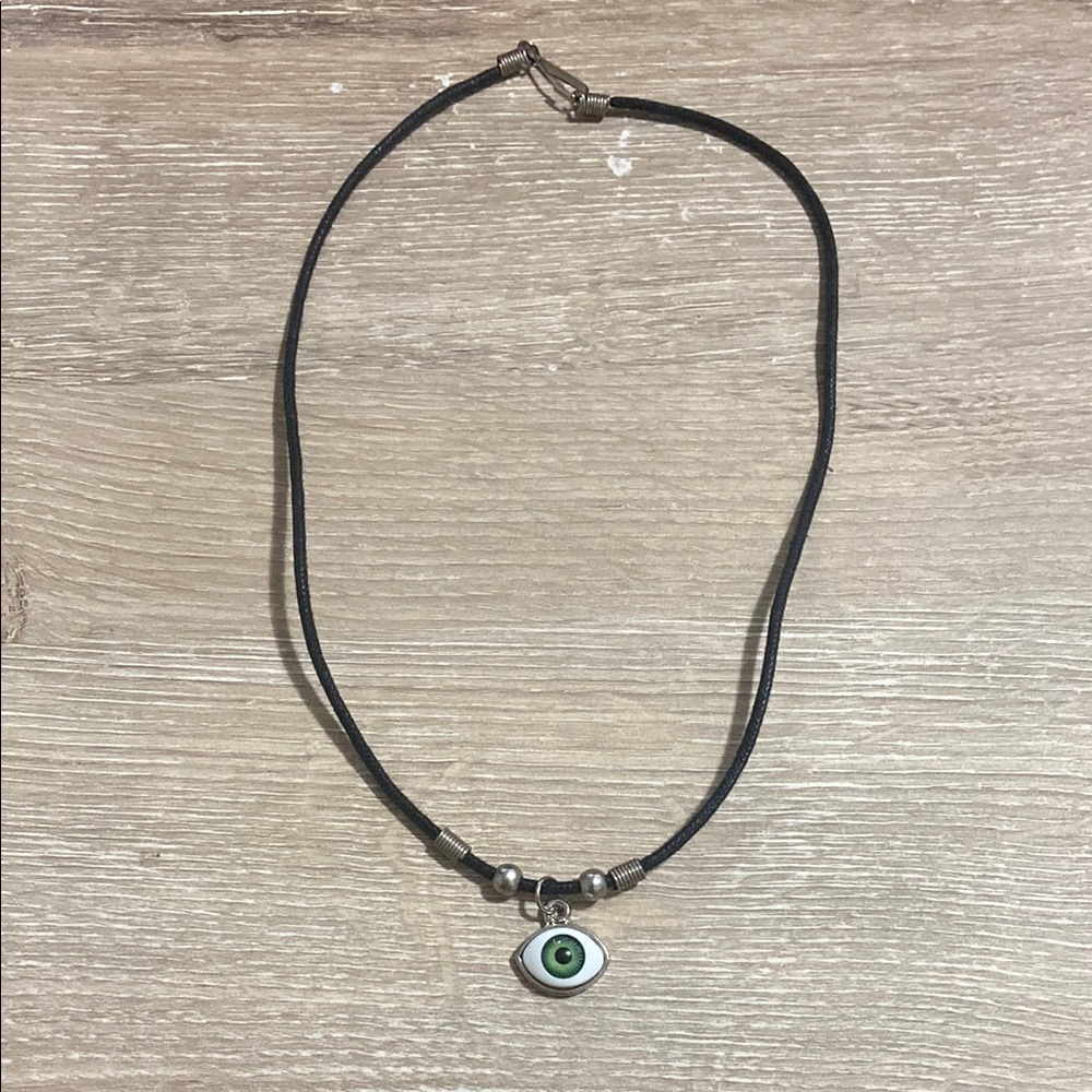 Vintage Black Cord Necklace with Green Eye Pendant